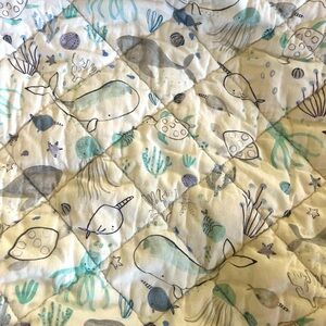 Changing Pad Sheets - Crate & Barrel and Burts Bees.